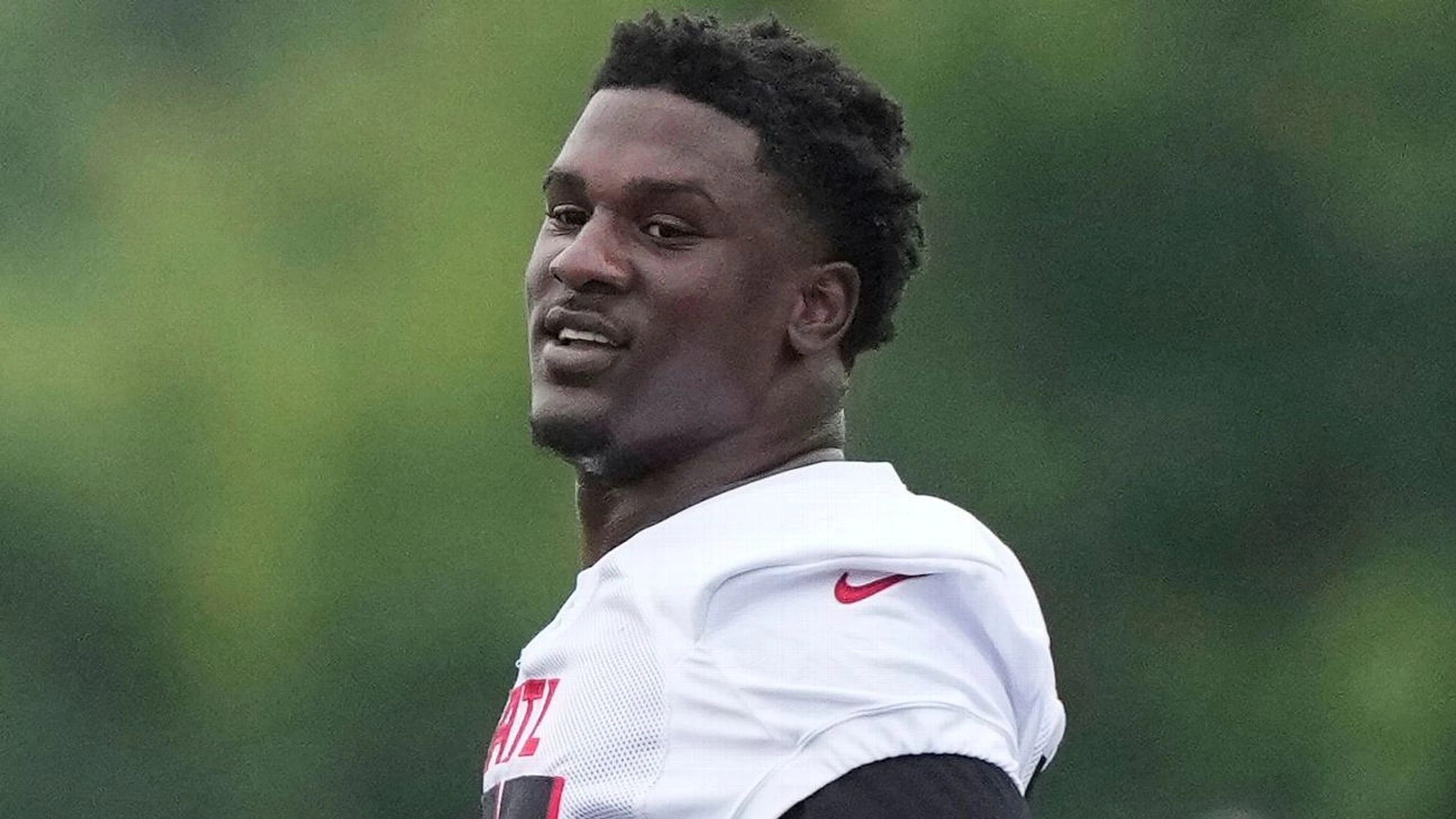 Falcons' Pearce, facing 3 felonies, not at workouts