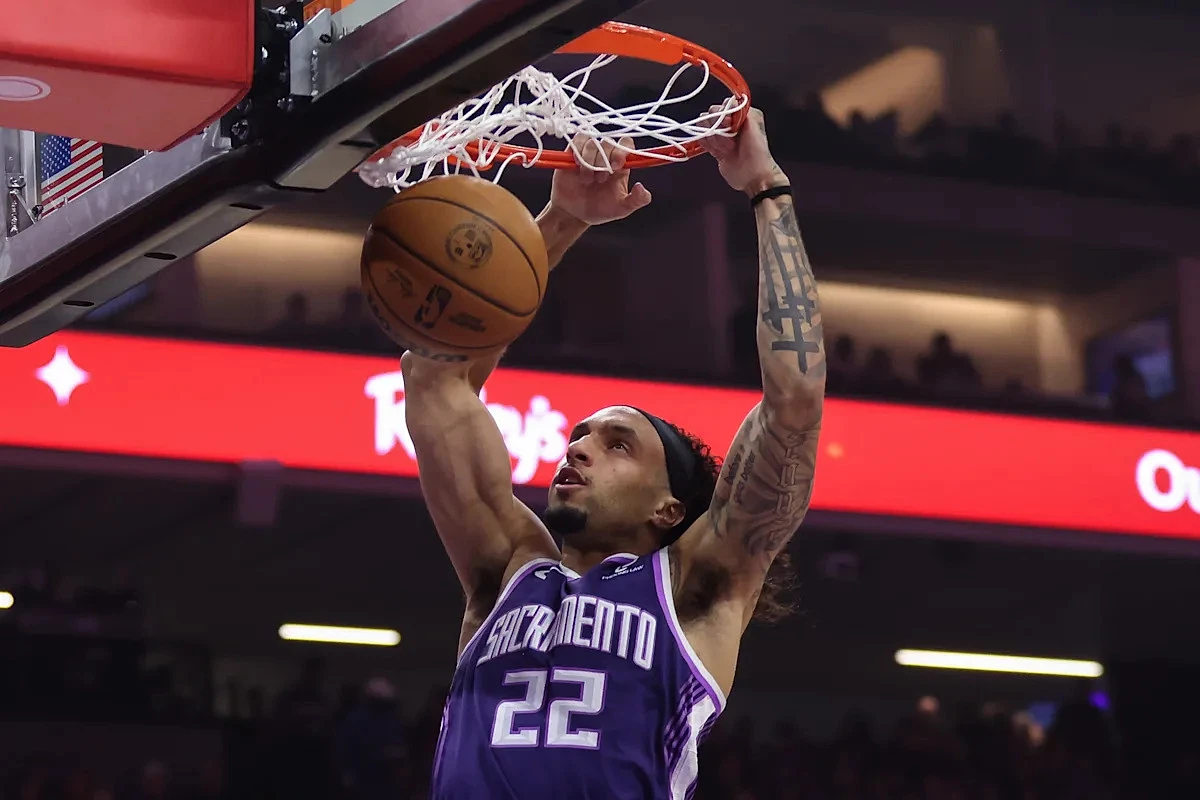 Devin Carter scores 29 points to lead the Kings to a 124-118 win over the Warriors - Image 1
