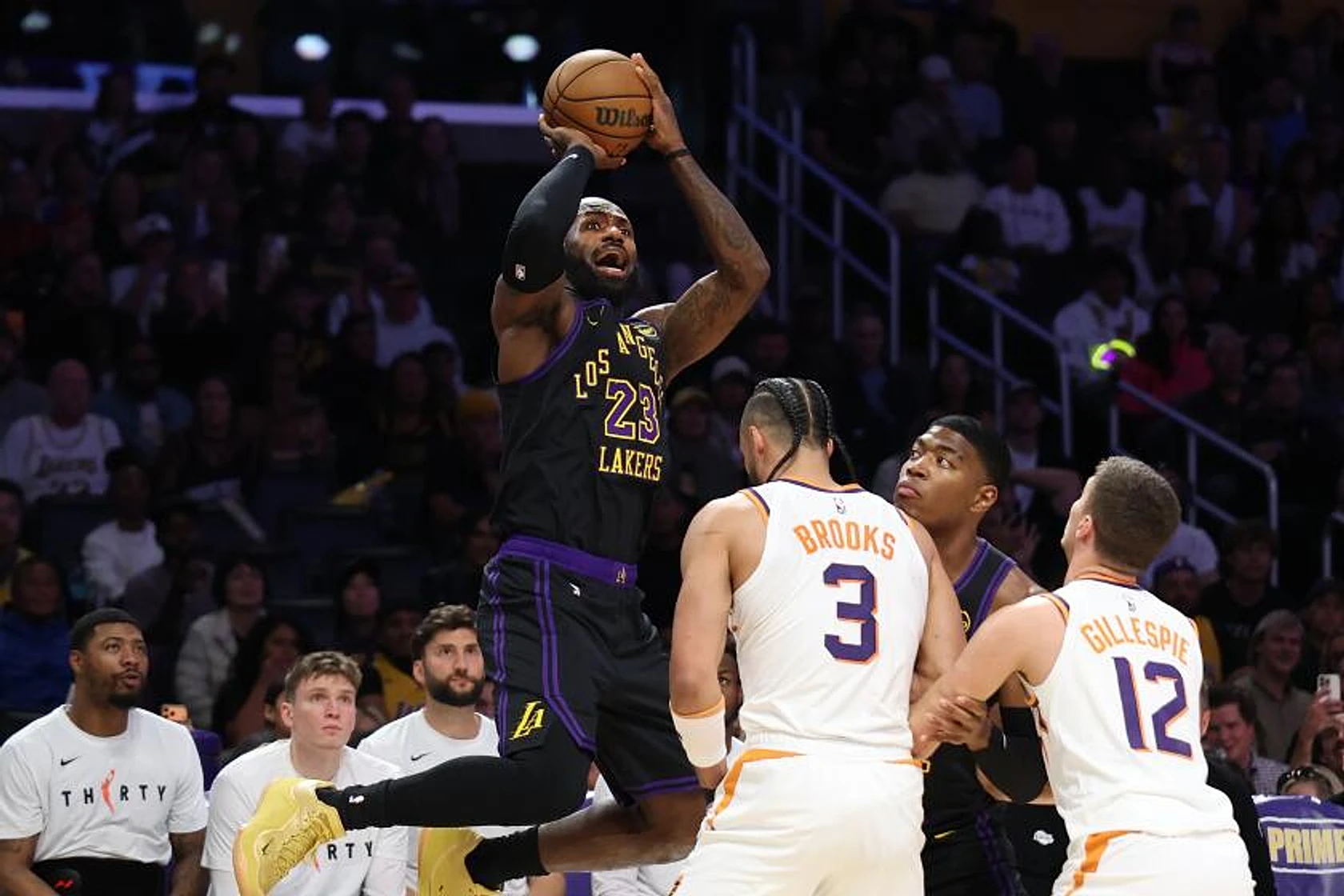 LeBron James and resilient Lakers defeat Suns, stay in hunt for No. 3 playoff seed - Image 1