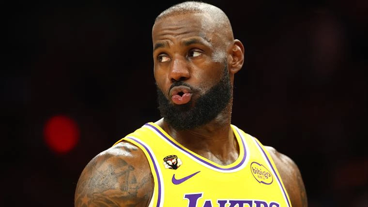 LeBron James reacts to people's disbelief in his reverse dunk against the Rockets