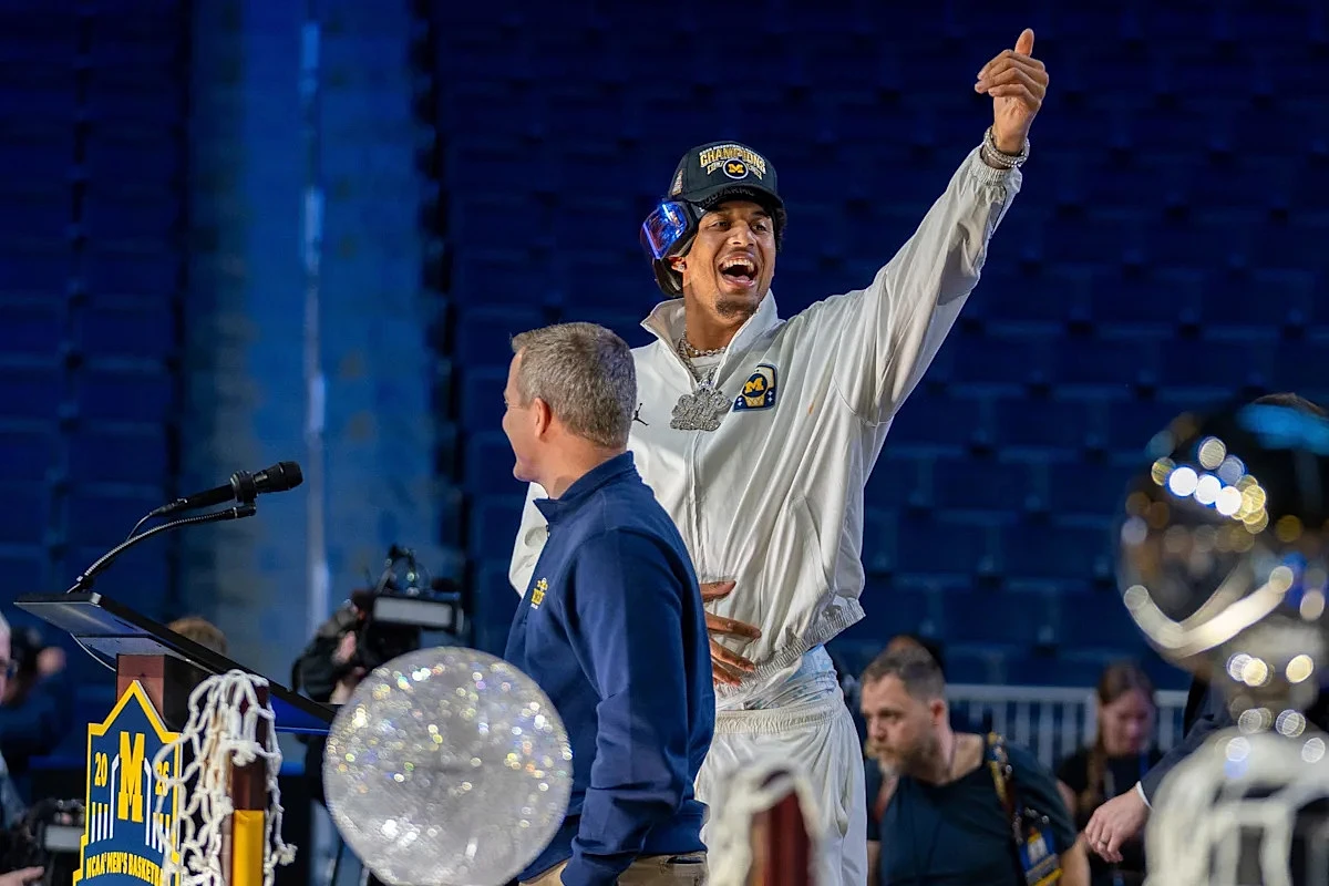 Michigan's NCAA champions honored at Pistons game