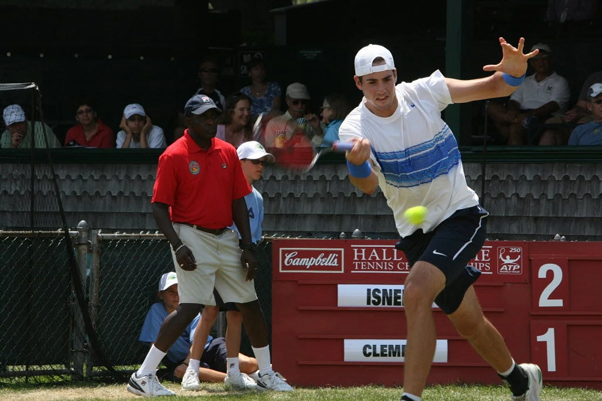 Arkansas cutting tennis programs prompts backlash from former pro John Isner - Image 1