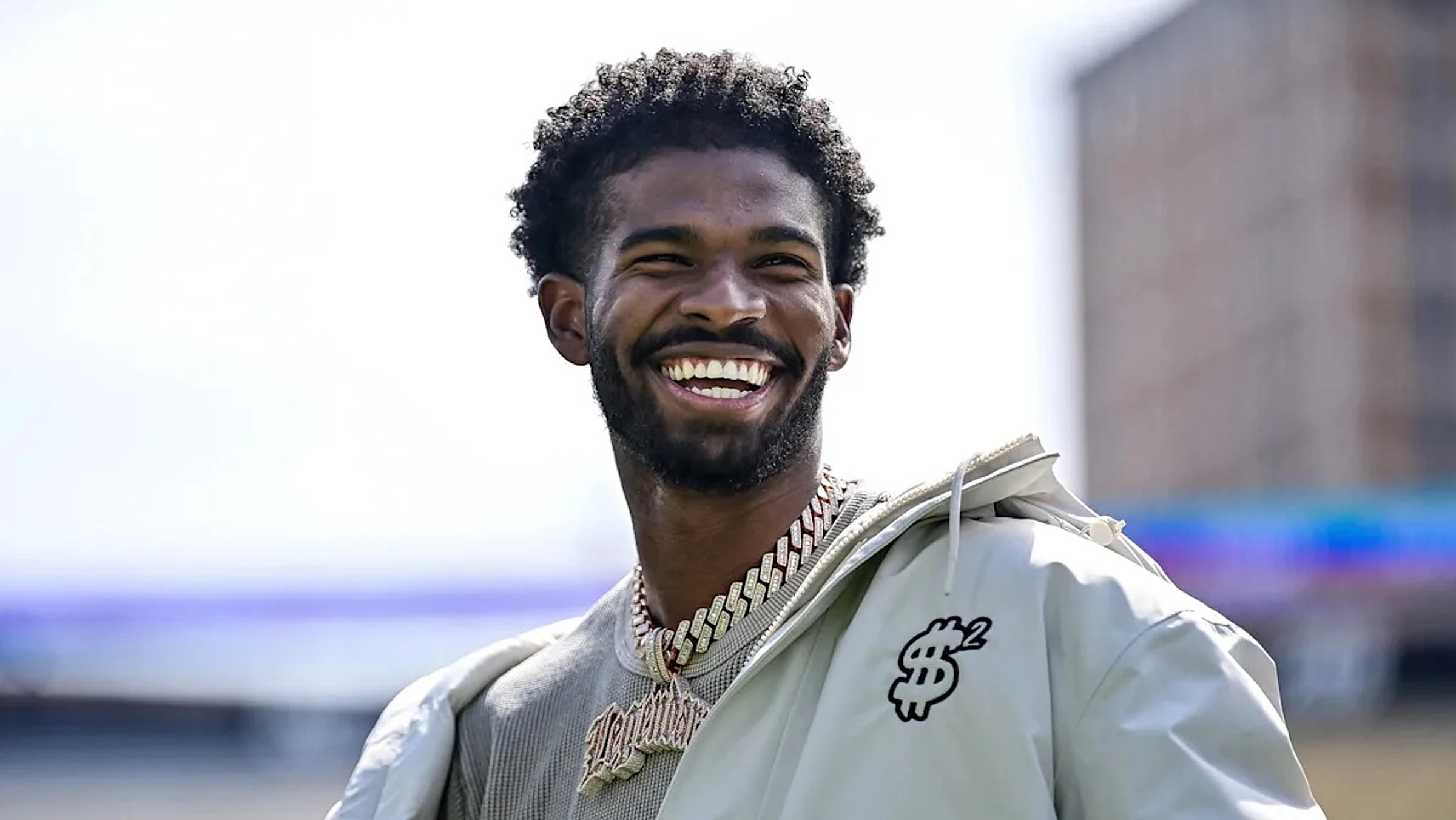 Like father, like son: Shedeur Sanders channels his father’s iconic gameday photo as he graduates from Colorado