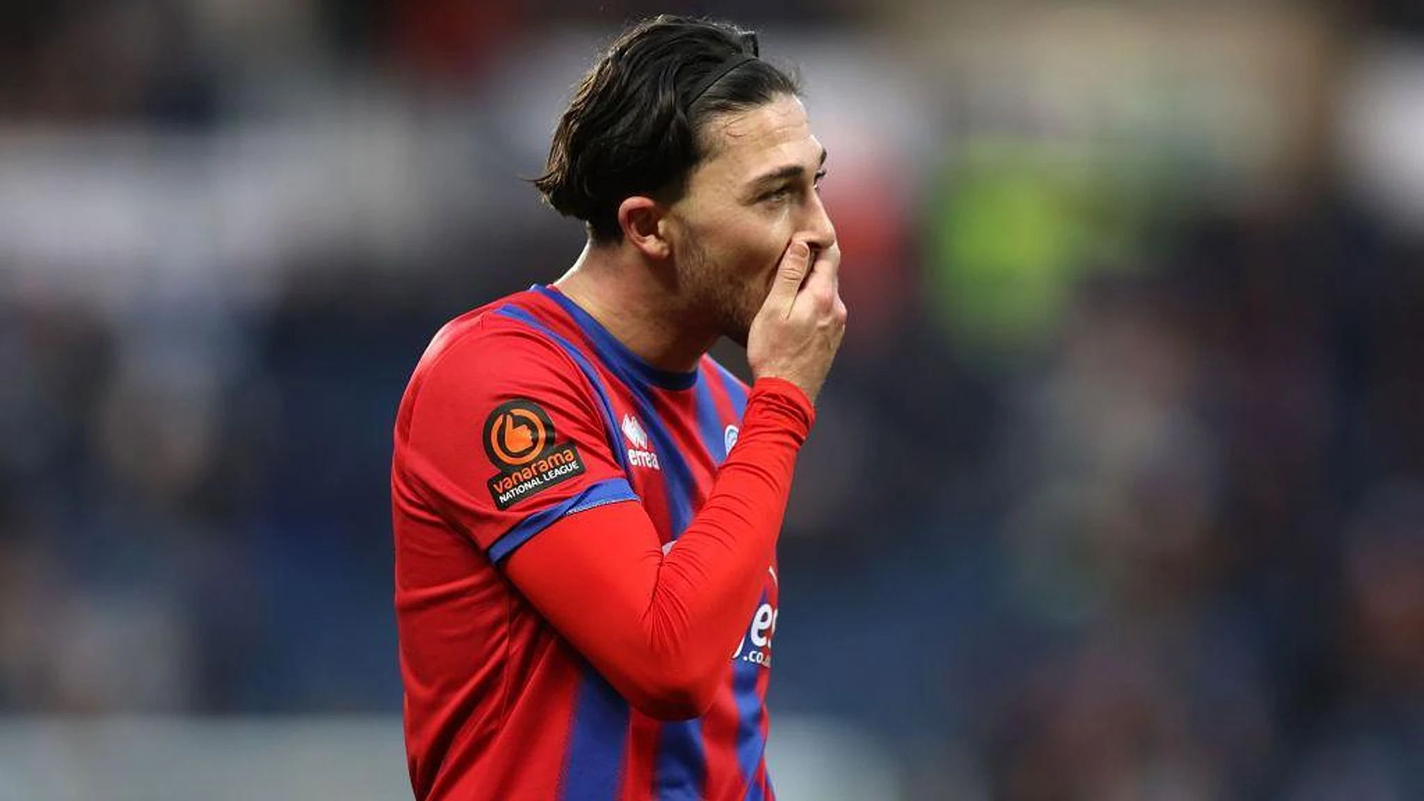 Aldershot defender Harfield signs one-year extension