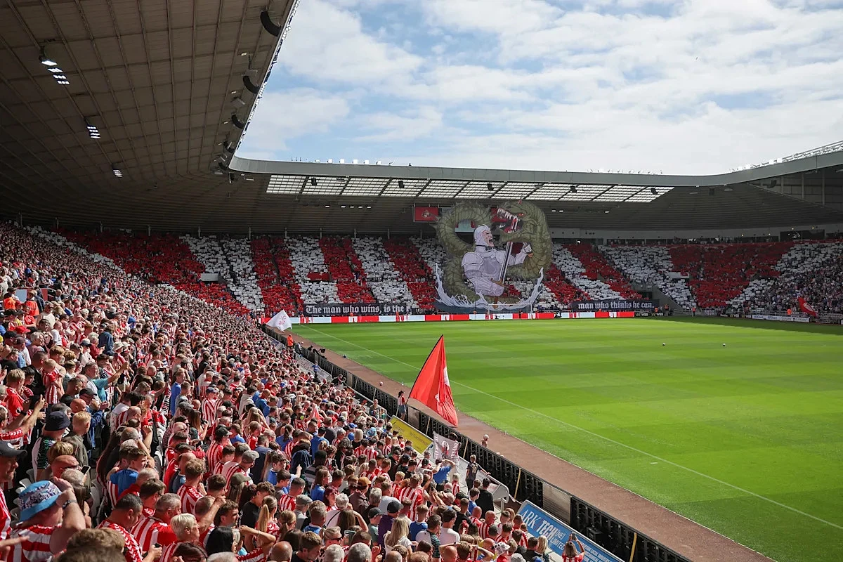 “Black Cats And Red Devils”