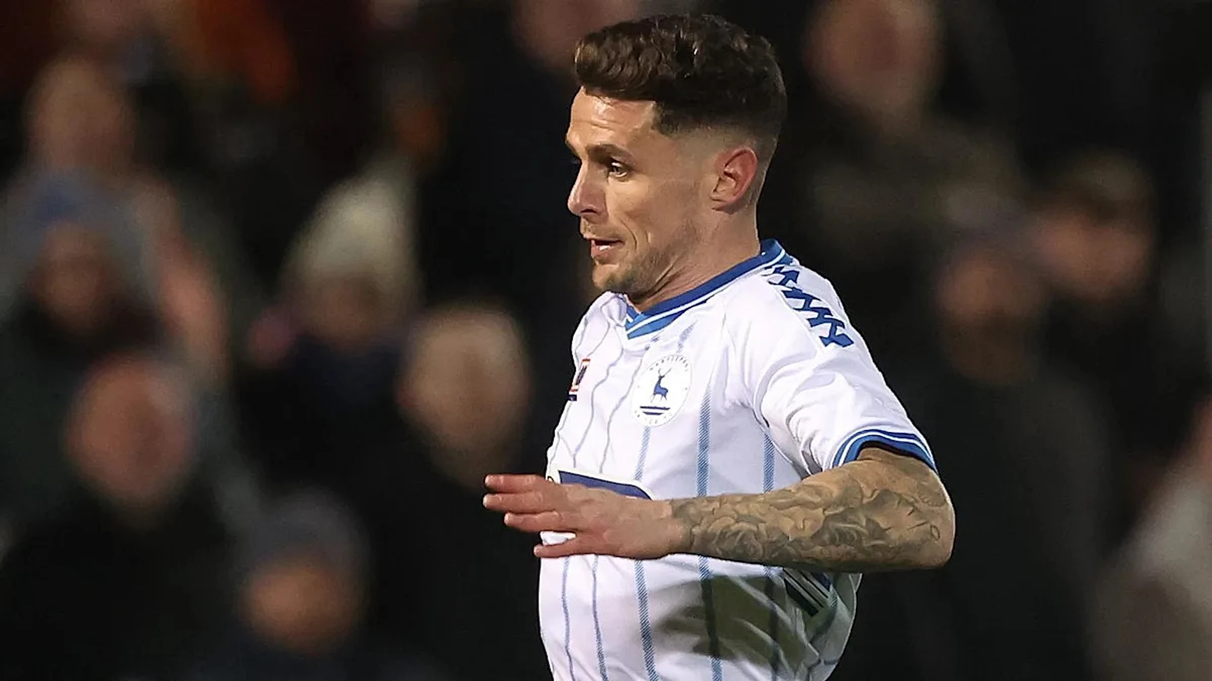 Boston sign midfielder Holohan