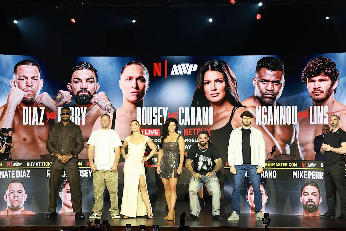 Rousey vs. Carano broadcast team set, includes Jon Jones and Cain Velasquez