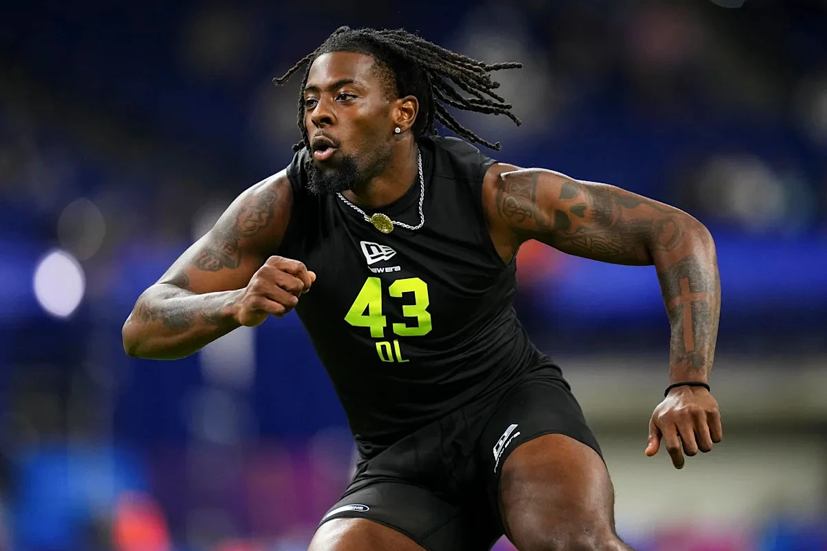 Patriots draft pick charged with domestic assault