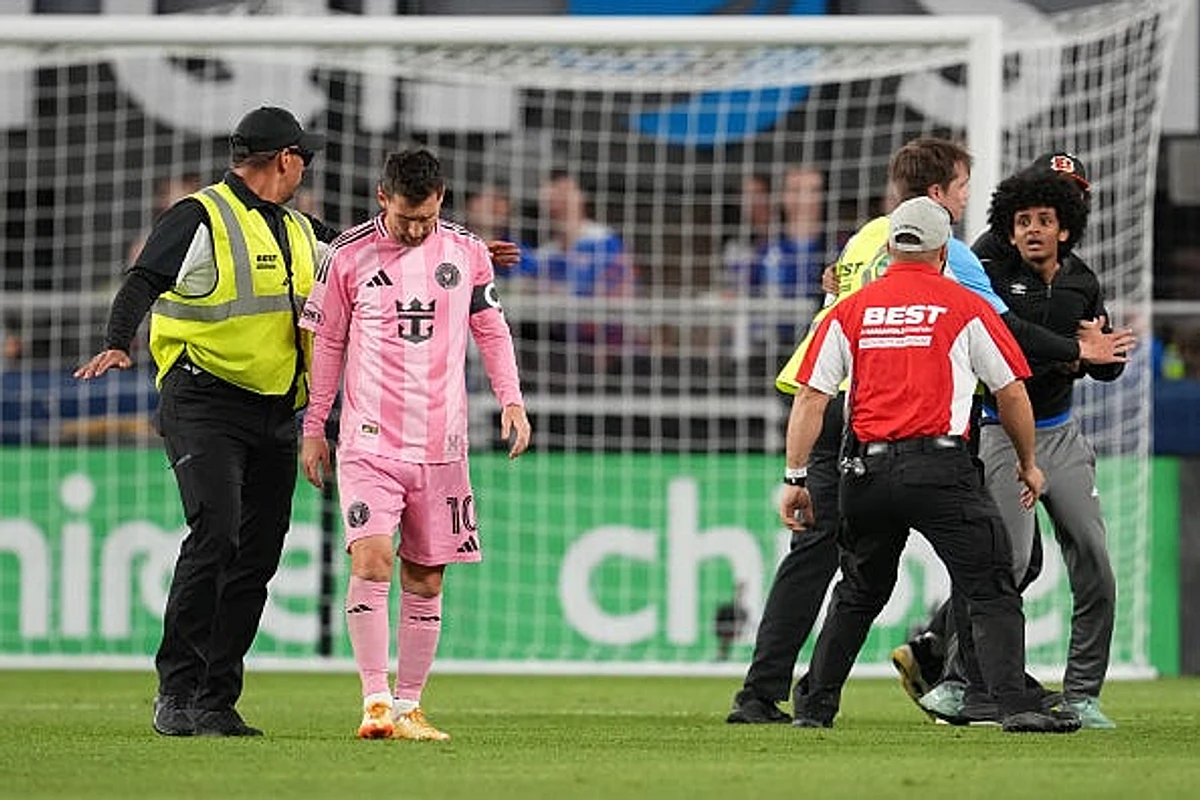 Security shields Lionel Messi from fan during FC Cincinnati-Miami game