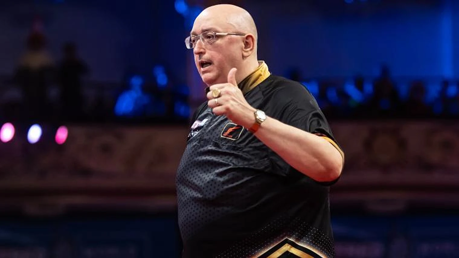 Gilding's glory: Goldfinger downs Premier League star to claim Players Championship title