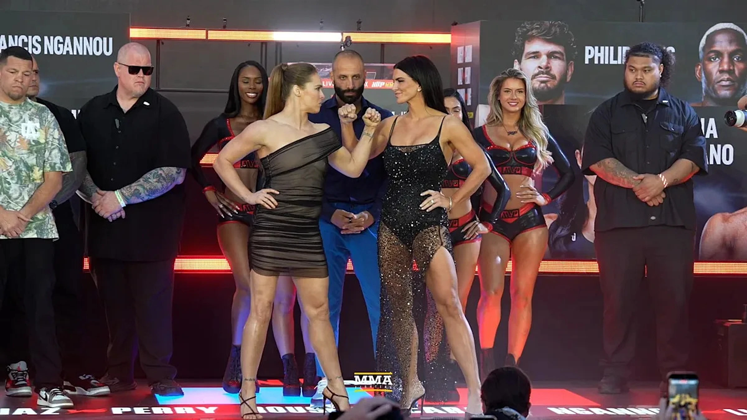 Ronda Rousey, Gina Carano share stoic faceoff, Nate Diaz and Mike Perry all business ahead of fight