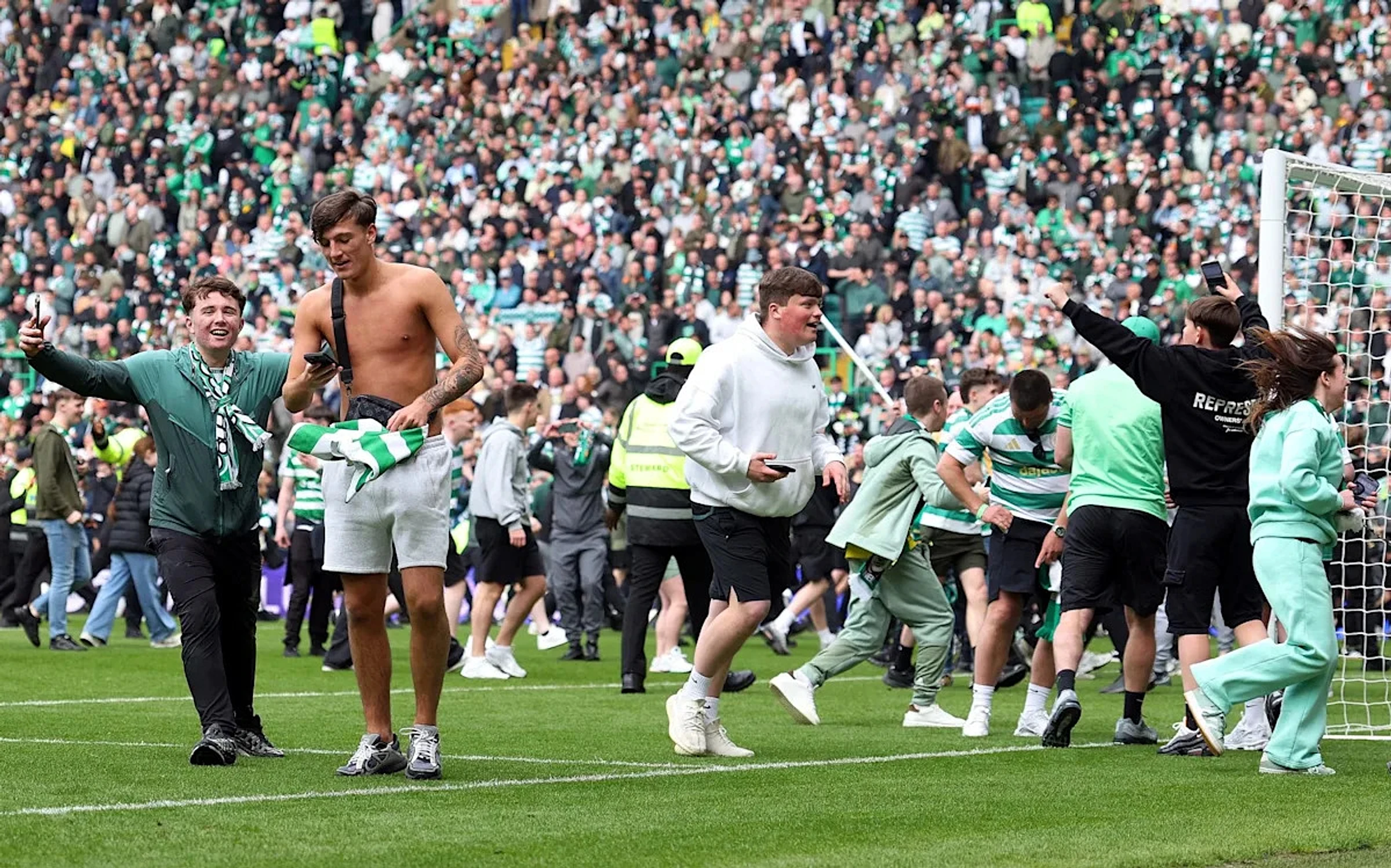 Hearts broken before pitch invasion by Celtic fans spoils title-winning party